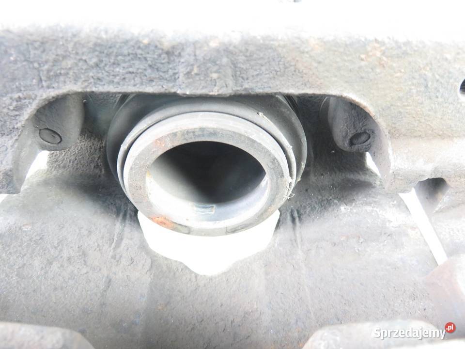 ZACISK PRAWY PRZÓD DACIA DUSTER 16 16V 4x4 Układ hamulcowy