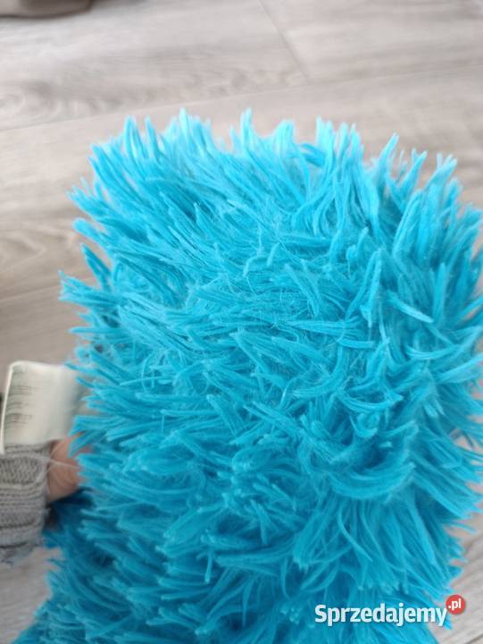 pluszowa poduszka która przypomina postać z