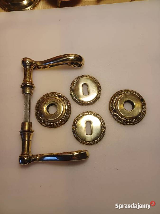 Mosiężne klamki z rozetami