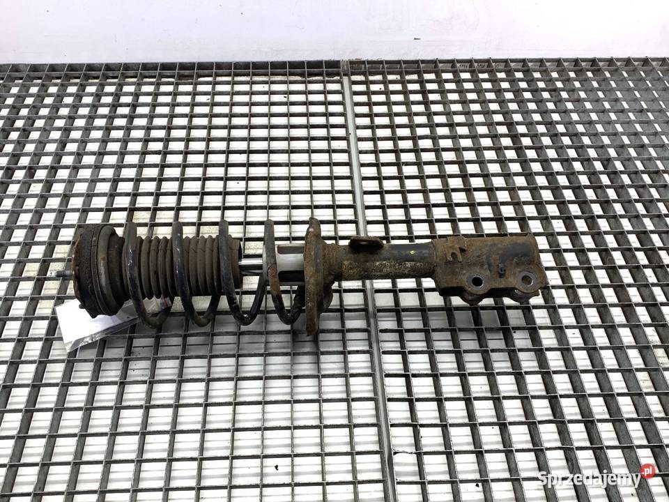 AMORTYZATOR LEWY PRZÓD ZE SPRĘŻYNĄ FORD FIESTA