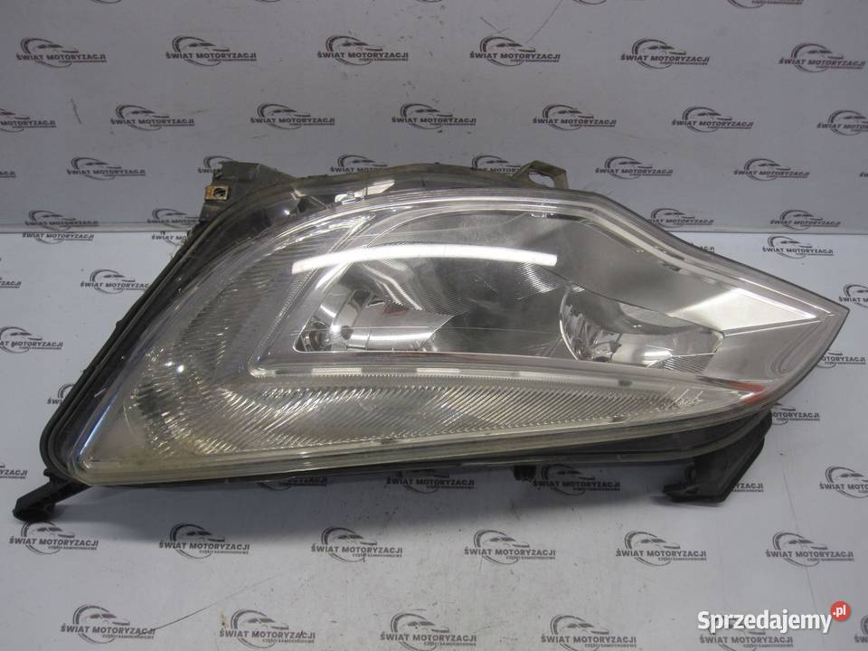 OPEL ASTRA J 10r lampa lewa przód 13253656