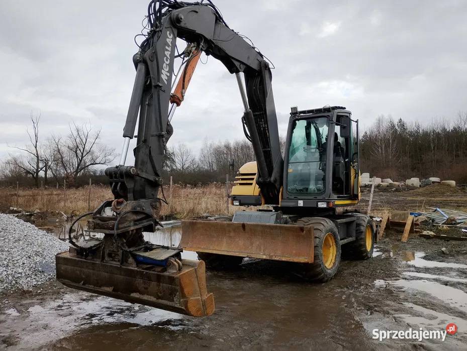 Usługi Koparką kołową Mecalac 714MW Roboty