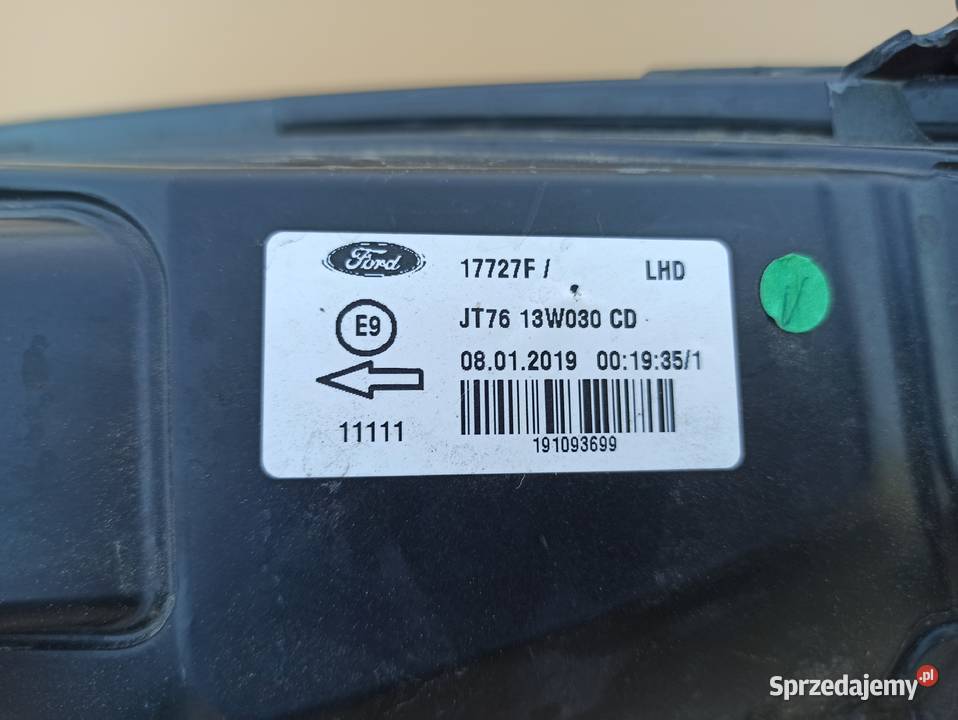 FORD TRANSIT COURIER REFLEKTOR LEWY LAMPA LEWA Trzciel