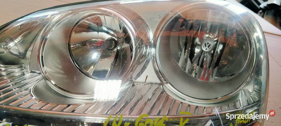 VW GOLF V 0308 REFLEKTOR LEWY PRZÓD HELLA Lampy przednie śląskie