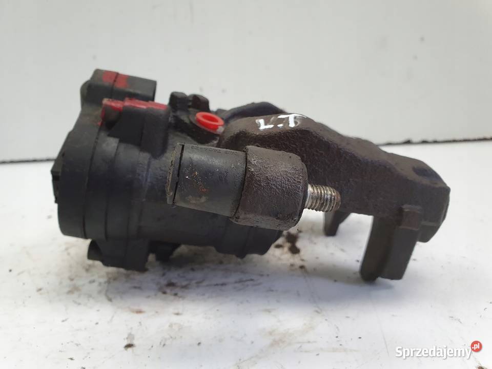 VW Passat B8 TYLNY ZACISK HAMULCOWY LEWY tył Chełm