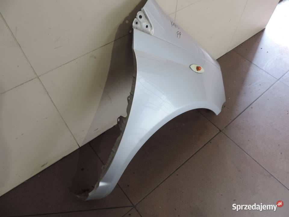 BŁOTNIK PRAWY PRZÓD TOYOTA YARIS 1 FL KOLOR 1E7 Karoseria Nowy Sącz