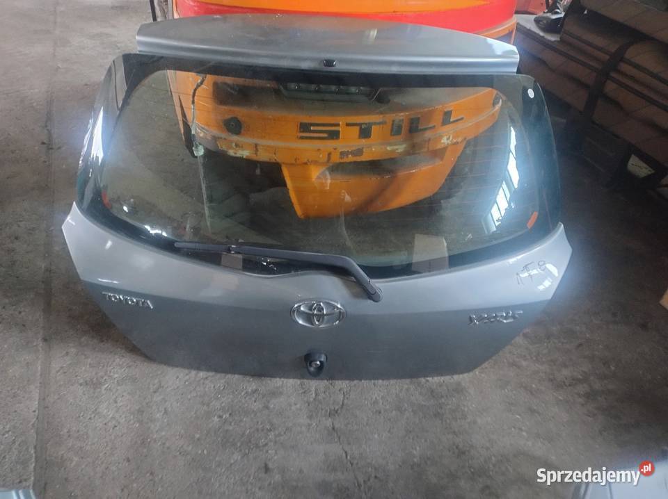 Klapa Bagażnika Kpl Lak1E71F8 Toyota Yaris II 5