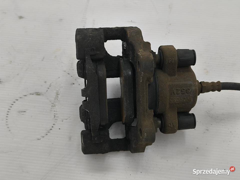 ZACISK LEWY TYŁ BMW F30 F31 20D LIFT