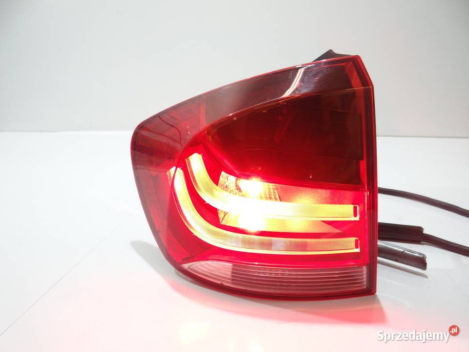 LAMPA LEWA TYLNA BMW X1 E84 OE 2990109 Strzyżewice