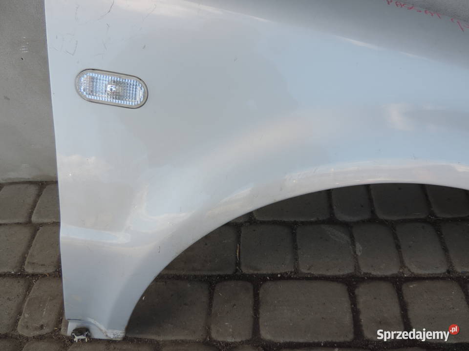 BŁOTNIK PRAWY PRZÓD VW PASSAT B5 LB7Z Nowy Sącz