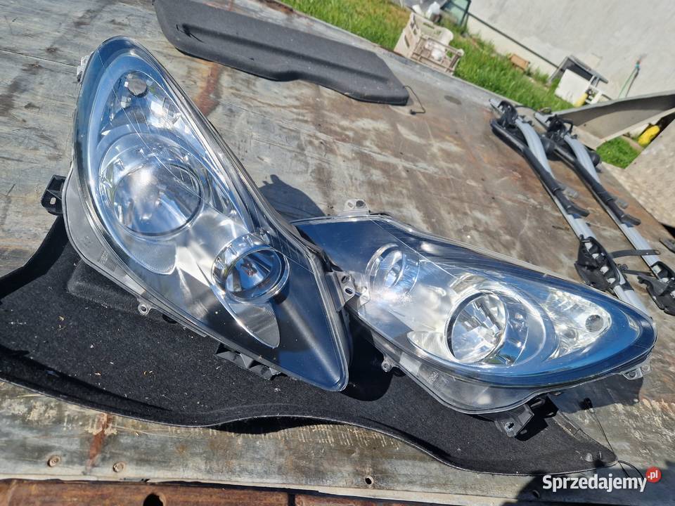 Opel Corsa D reflektor ORG EU Części samochodowe Mielec
