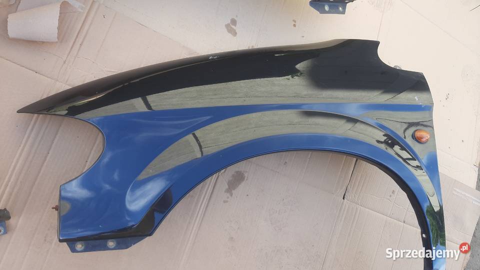 błotnik prawy lewy Chrysler Voyager IV czarny