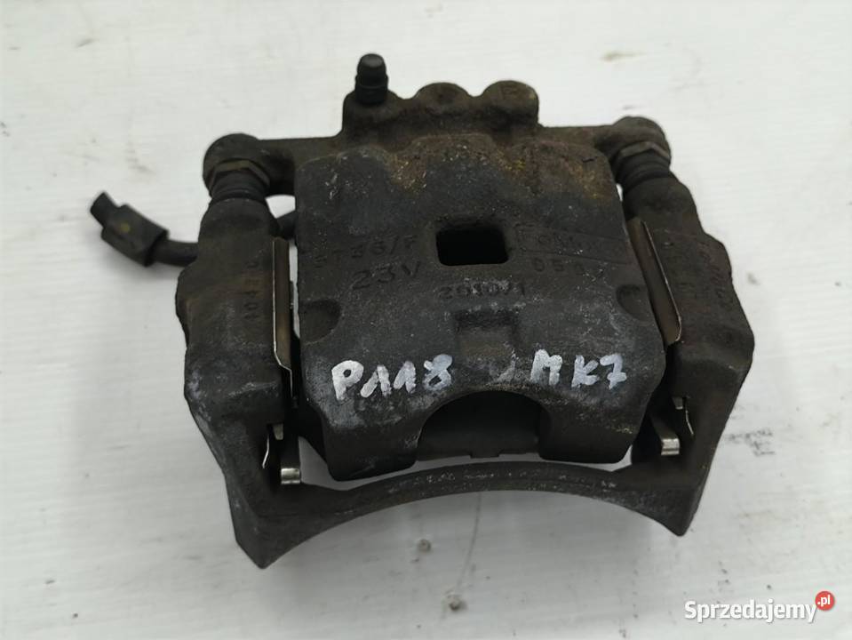 ZACISK PRAWY PRZÓD FORD FIESTA MK7 LIFT 10 Zaciski i jarzma