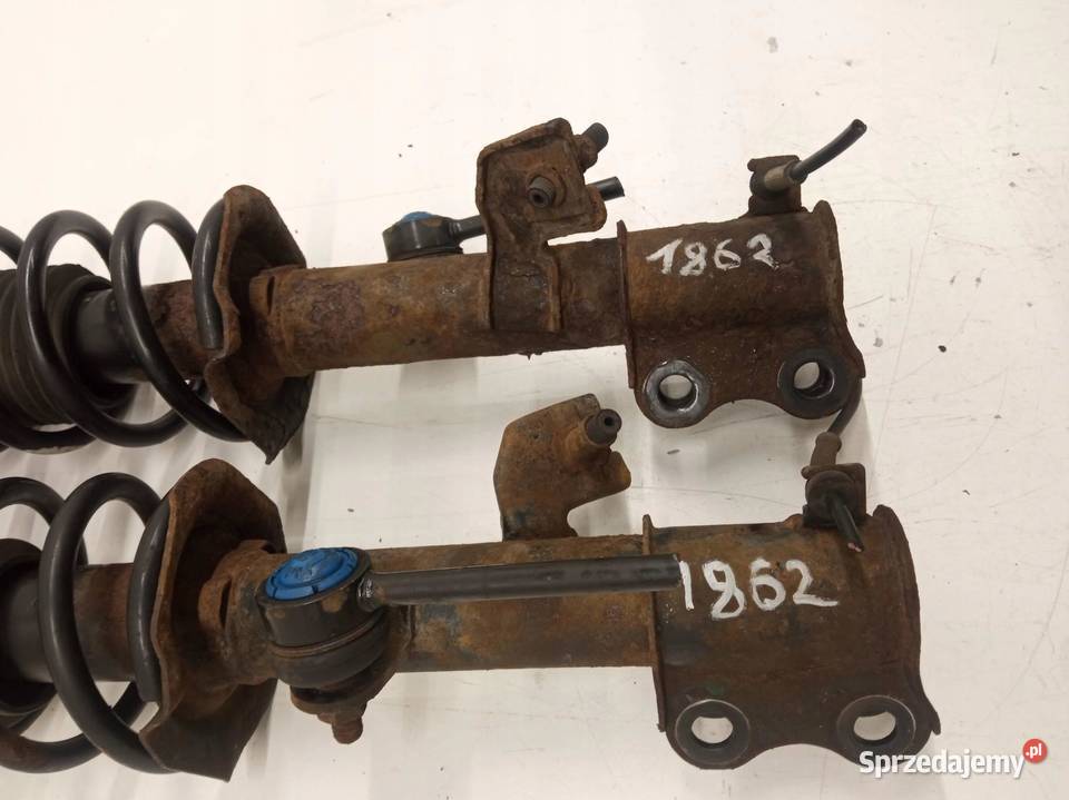 AMORTYZATOR PRAWY LEWY PRZÓD KPL 12 B K13 Nissan