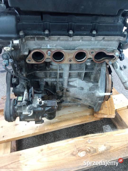 SILNIK KOMPLETNY BENZYNA K12B 1328788 12 16V