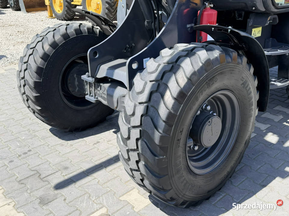 średnia kołowa Holland W70C Compact Widły Łyżka Maszyny budowlane Widełki