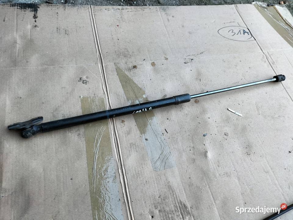 OPEL CORSA D SIŁOWNIK TELESKOP TYLNEJ KLAPY Kamień-Kolonia