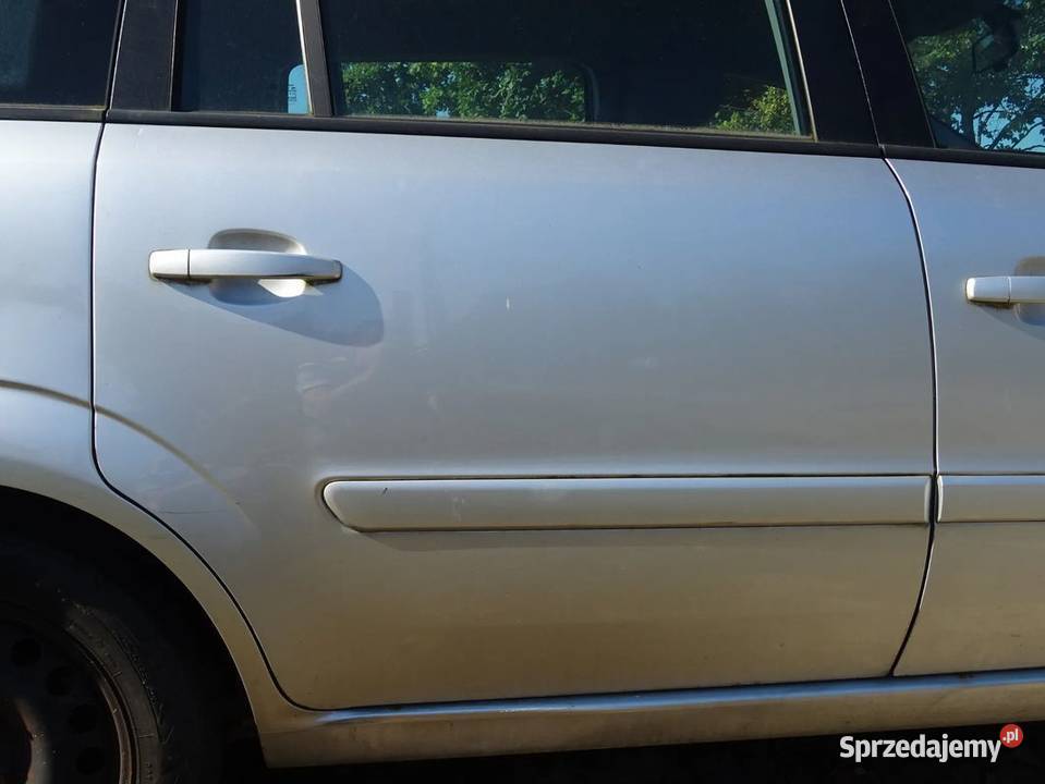 Drzwi szyba mechanizm podnośnik srebrne Zafira B Parcice sprzedam