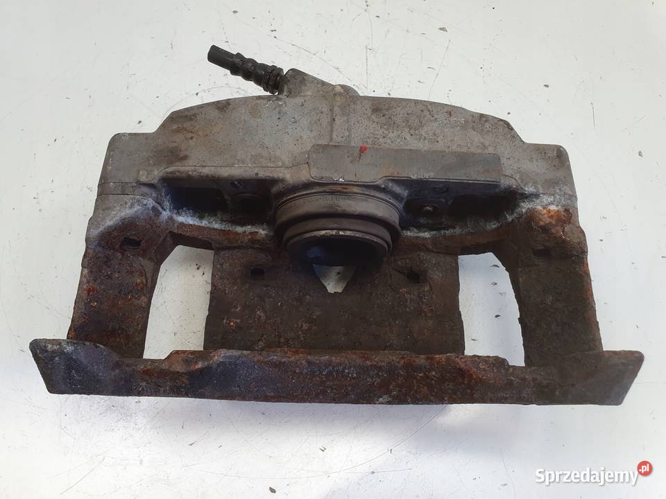 Volvo S60 II V60 I PRZEDNI ZACISK HAMULCOWY lewy Układ hamulcowy Rudka