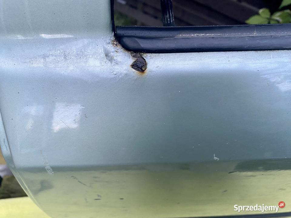 MercedesBenz E W124 Drzwi lewy tył Karoseria Łagiewniki