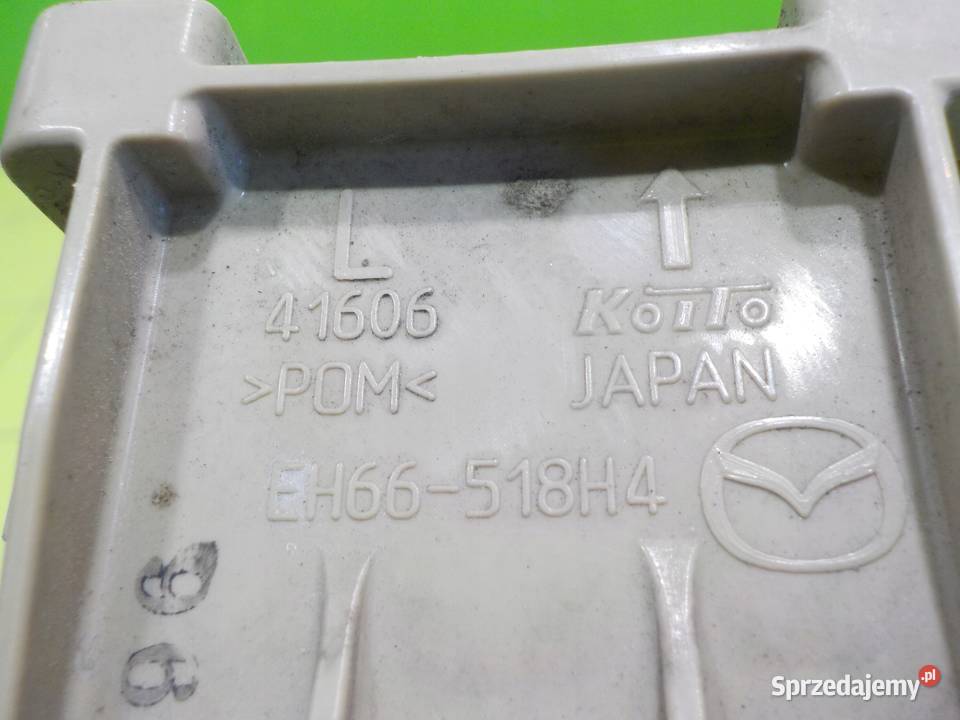 MAZDA CX7 LIFT 22 D 09r spryskiwacz lampy lewy Suków