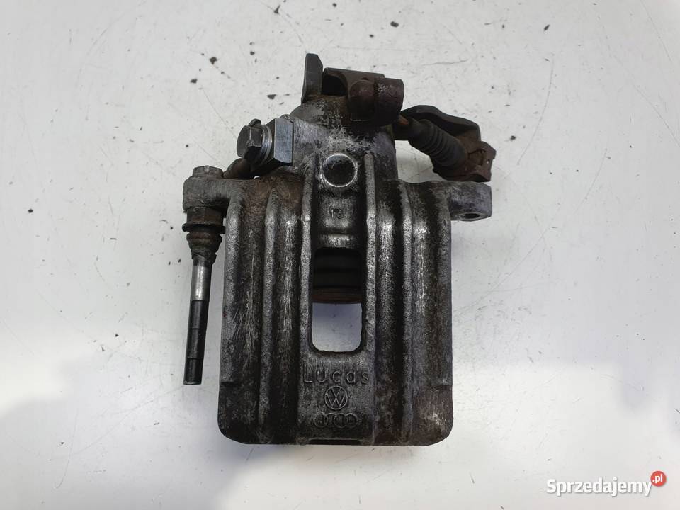 VW Golf IV Bora Audi A3 Toledo II LEWY ZACISK Chełm