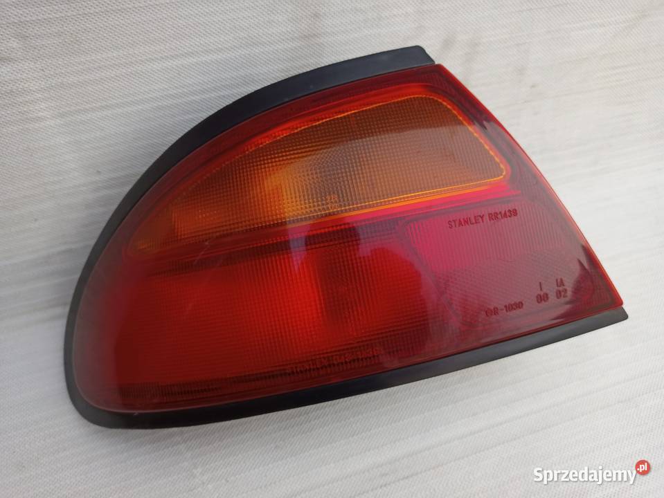 Mazda 323F BA lampa tył tylna lewa narożna w Sieradz sprzedam