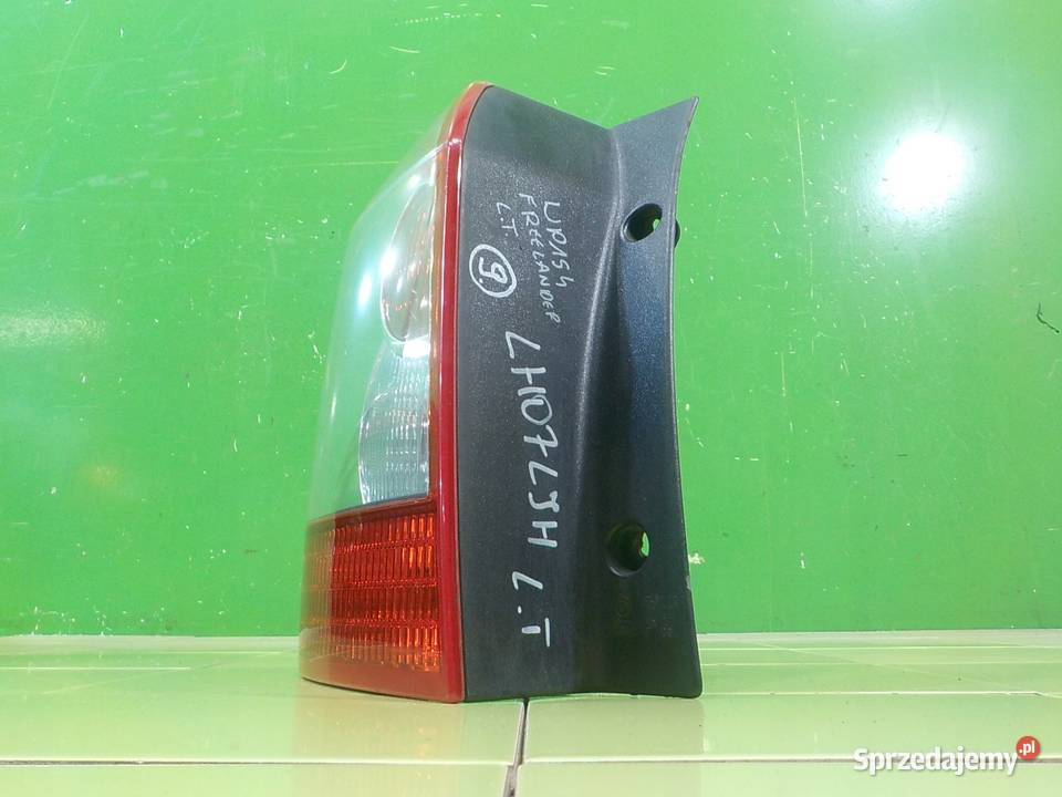 LAND ROVER FREELANDER II 22 TD4 07r lampa lewa Suków