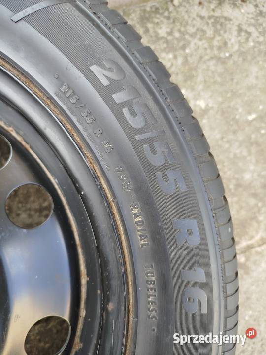 Koło zapasowe Opel 5x110 2155516 pokrowiec Września