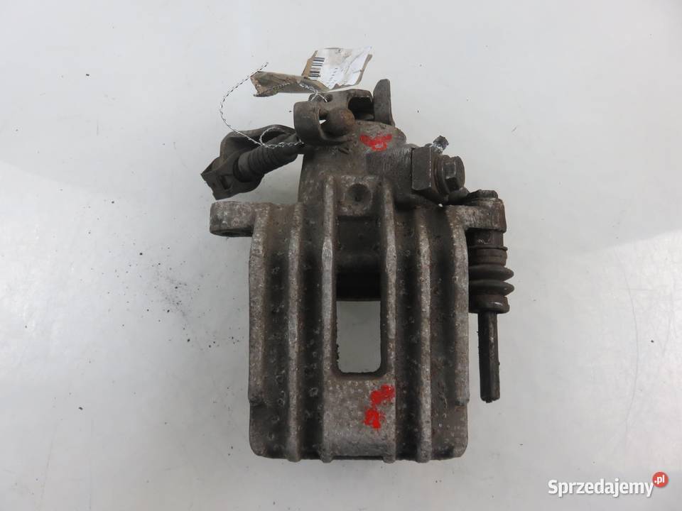ZACISK PRAWY TYŁ SKODA OCTAVIA I 19 TDI ASZ