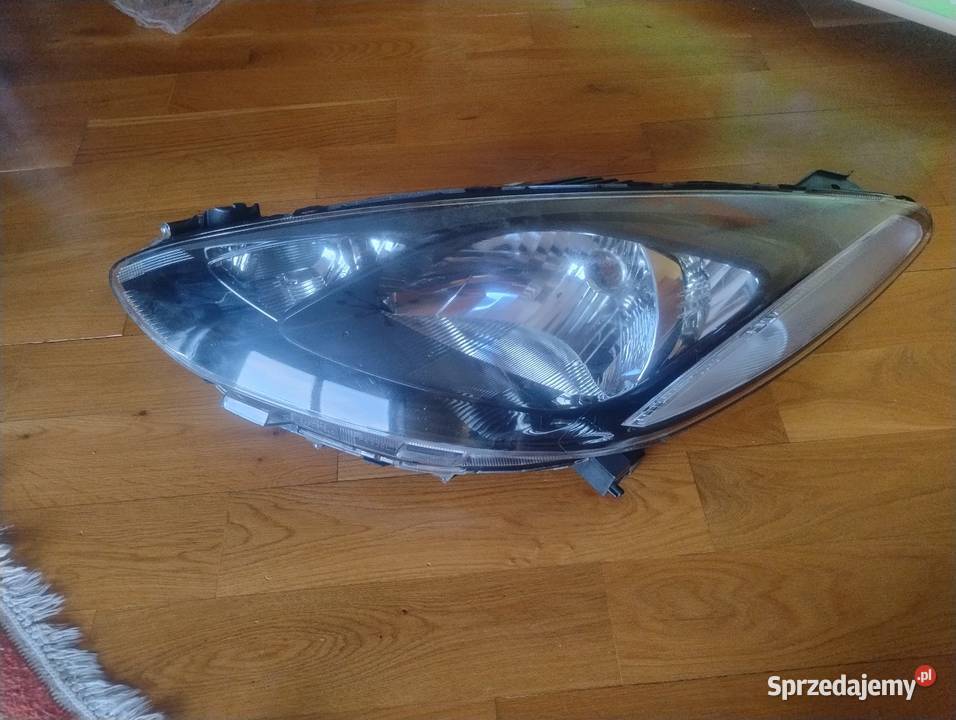 Mazda 2 0714 lampa reflektor lewa przednia przód Ślesin sprzedam