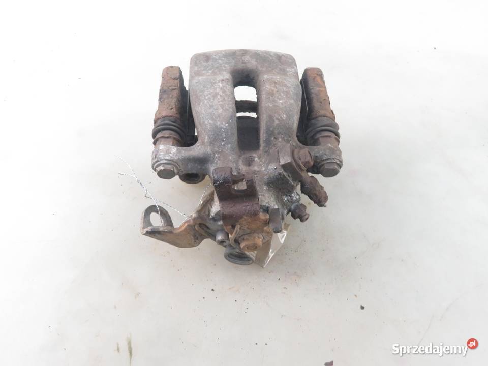 ZACISK LEWY TYŁ OPEL ASTRA III H 13 CDTI małopolskie
