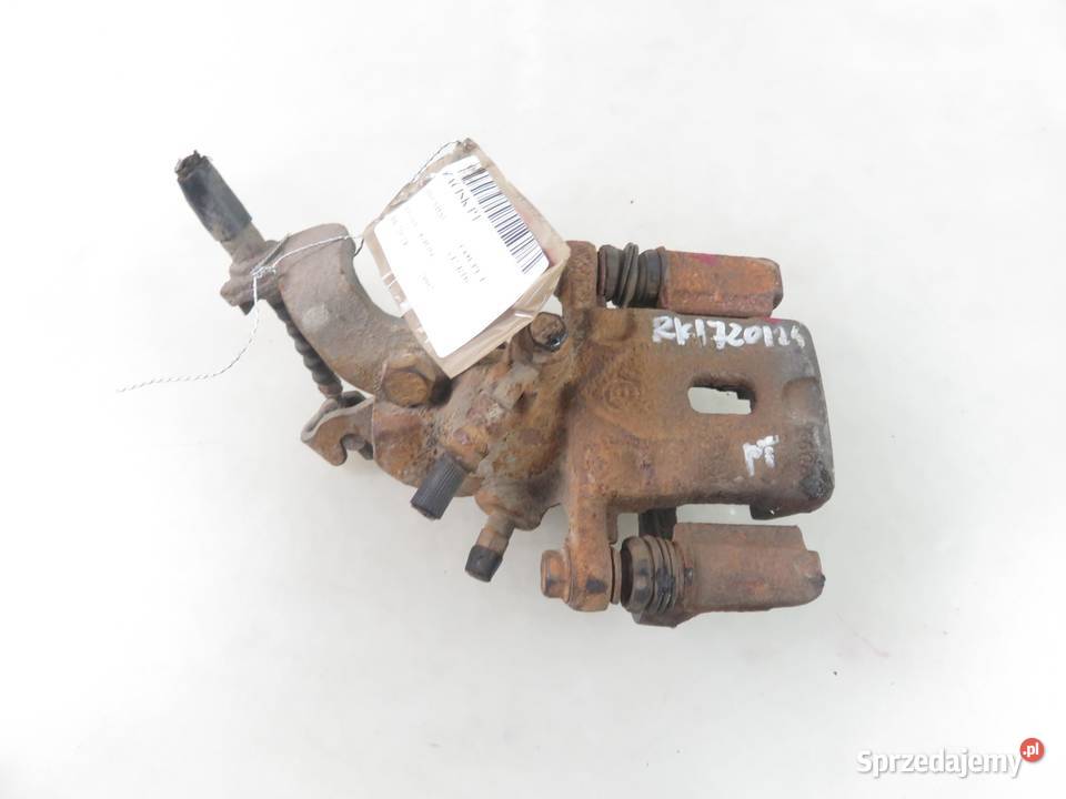 ZACISK PRAWY TYŁ HYUNDAI COUPE I 16 i 16V G4EDG osobowe Zaciski i jarzma Części samochodowe