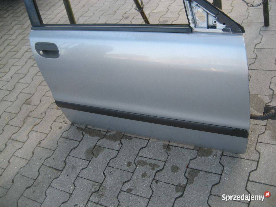 volvo s40 v40 9600r drzwi przód prawe srebne kod Rakoniewice