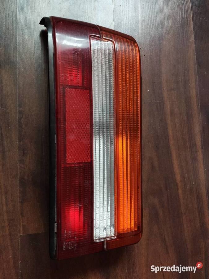 Lampa tylna lewa Peugeot 309 oryginalna AXO Jaworzno