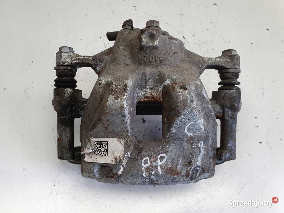 Toyota Corolla XII E21 PRZEDNI ZACISK HAMULCOWY osobowe