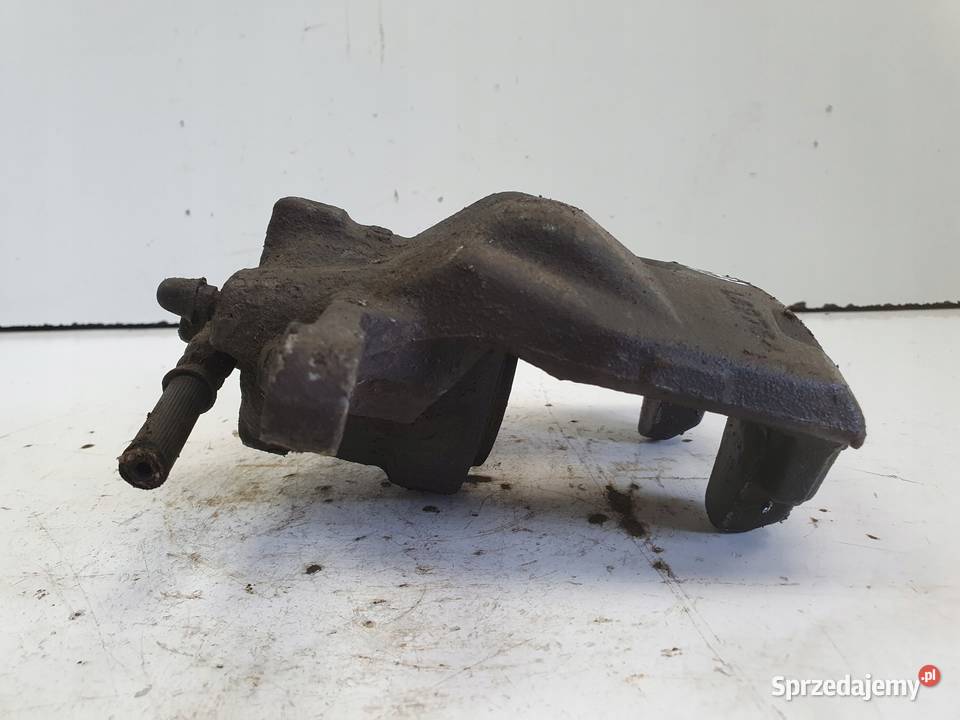 Toyota Corolla XII E21 PRAWY PRZEDNI ZACISK osobowe Rudka