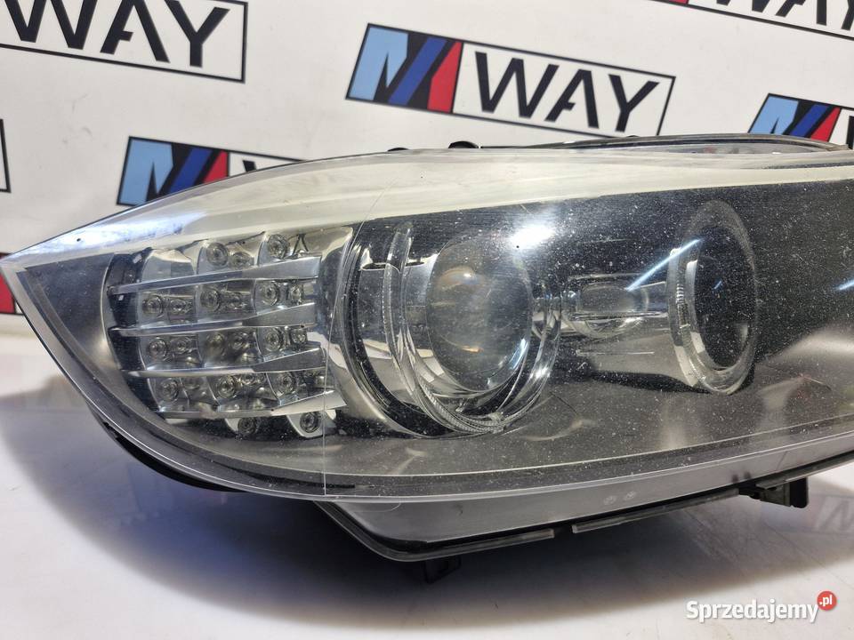 BMW E90 E91 LAMPA PRAWY PRZÓD ORYGINAŁ 7202584 Lampy przednie