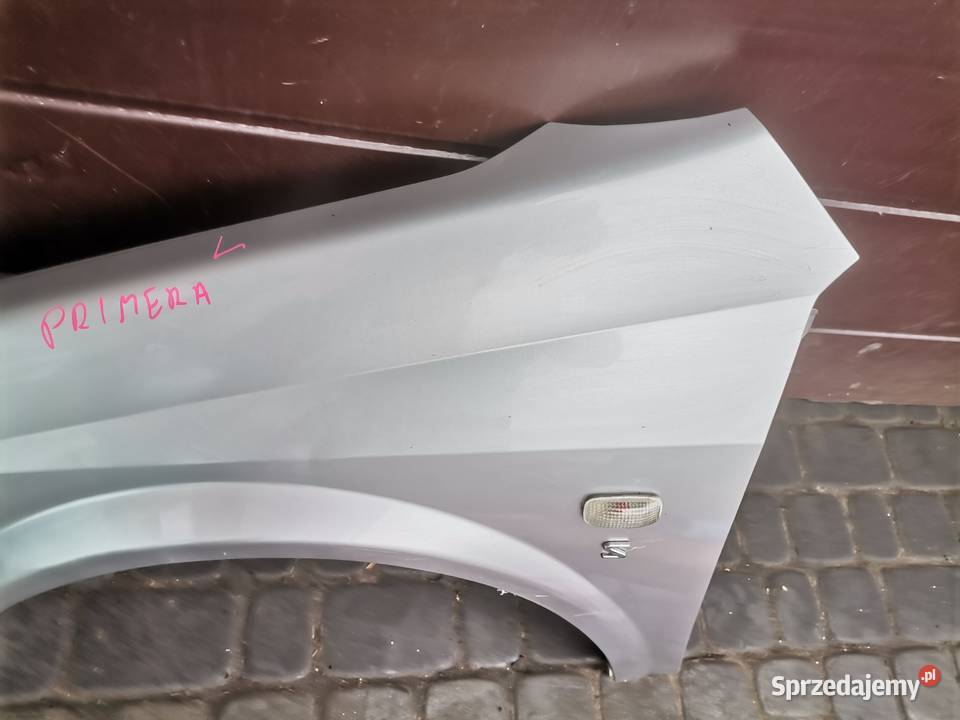 NISSAN PRIMERA P12 BŁOTNIK LEWY PRZEDNI KY0G Błotniki małopolskie Nowy Sącz
