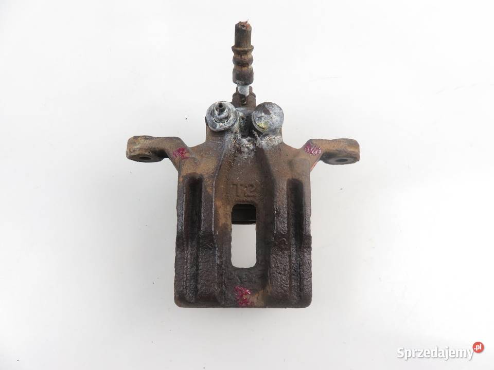 ZACISK PRAWY TYŁ NISSAN PATHFINDER III R51 40 Zaciski i jarzma