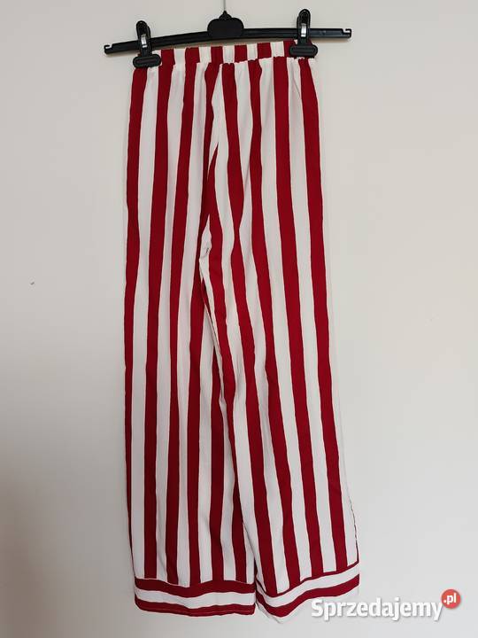 PrettyLittleThing Czerwonobiałe spodnie w paski Gdynia