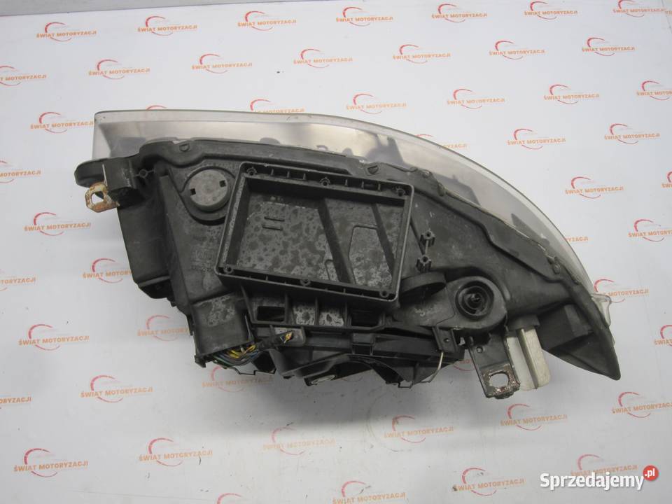 BMW E88 08r lampa lewa przód 7193389 ANGLIK Lampy przednie