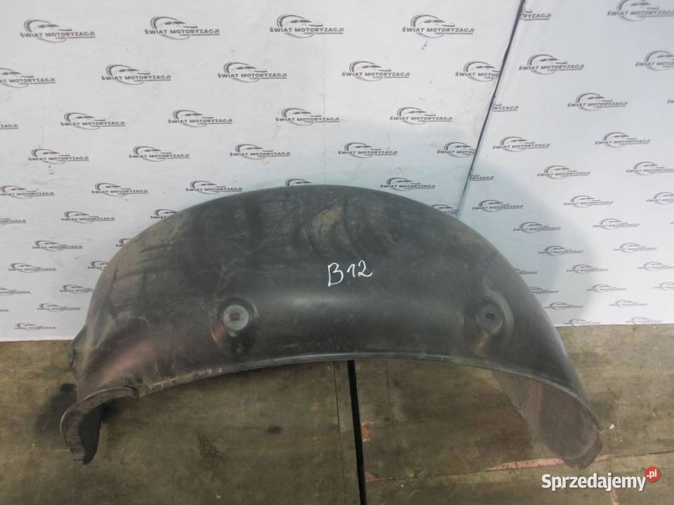 VOLKSWAGEN CADDY III nadkole lewe tył 2K5810971A osobowe
