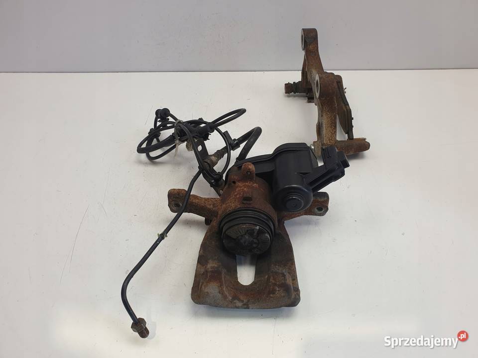 Ford F150 27 35 V6 15 ZACISK HAMULCOWY LEWY TYŁ Rudka