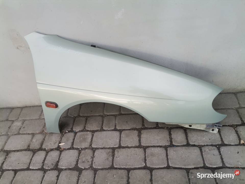 RENAULT MEGANE 1 FL BŁOTNIK PRAWY PRZEDNI MV931