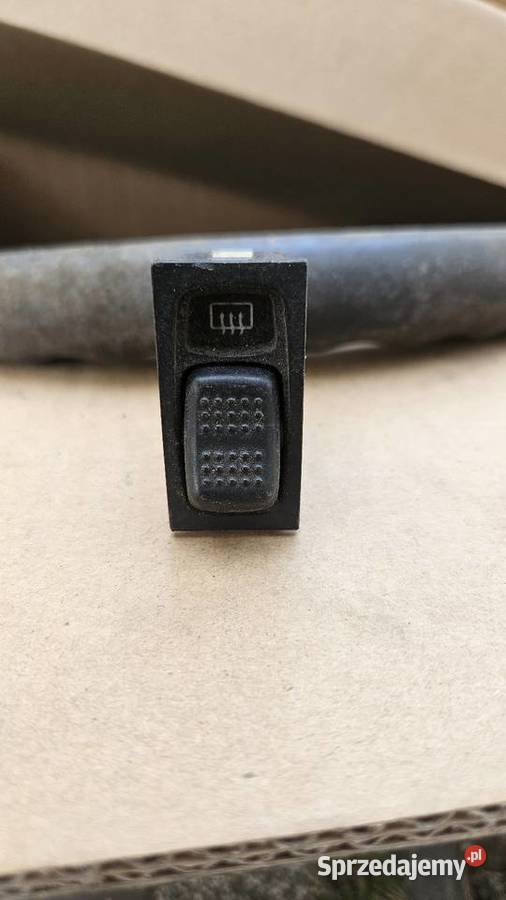 Włącznik ogrzewania tylnej szyby Ford Sierta