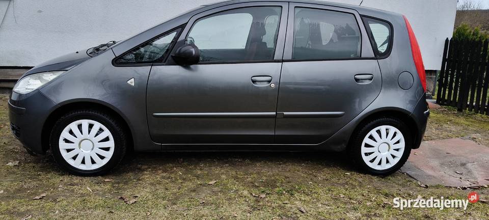 Mitsubishi Colt 15 109 benzyna zamiana Moto 125