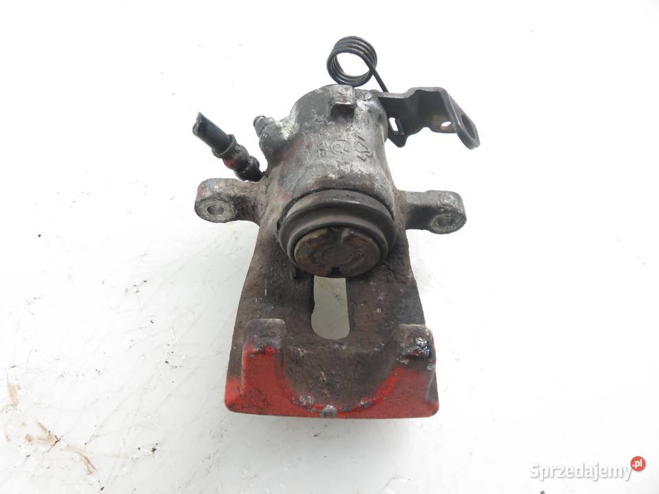 ZACISK PRAWY TYŁ OPEL ASTRA III H