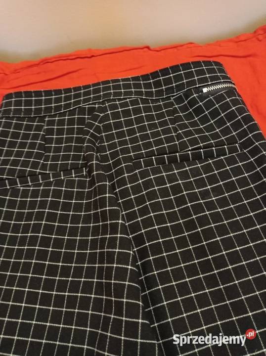 Spodnie w kratkę marki HM Spodnie Odzież damska podlaskie Hajnówka