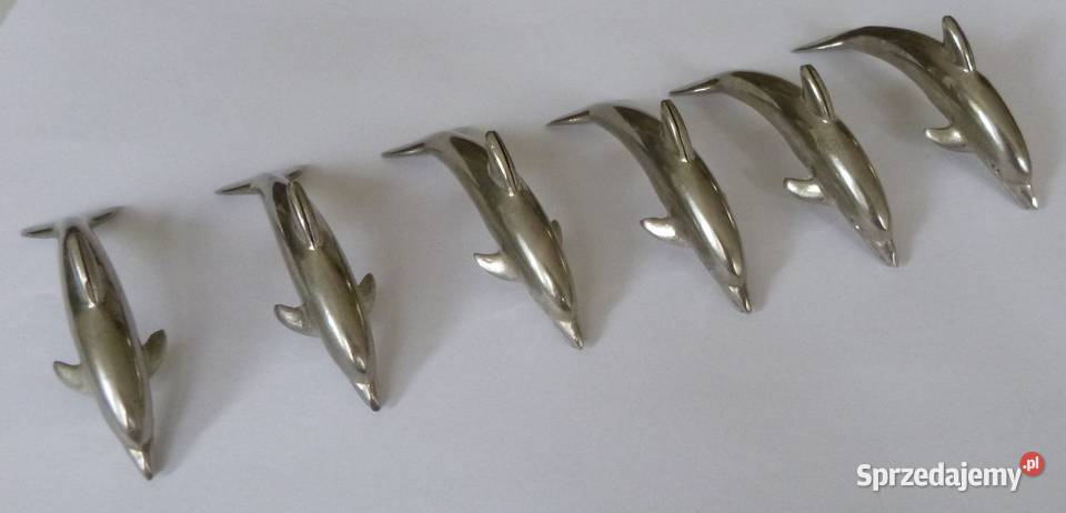 Metalowy serwetnikpodstawka delfin 6 sprzedam